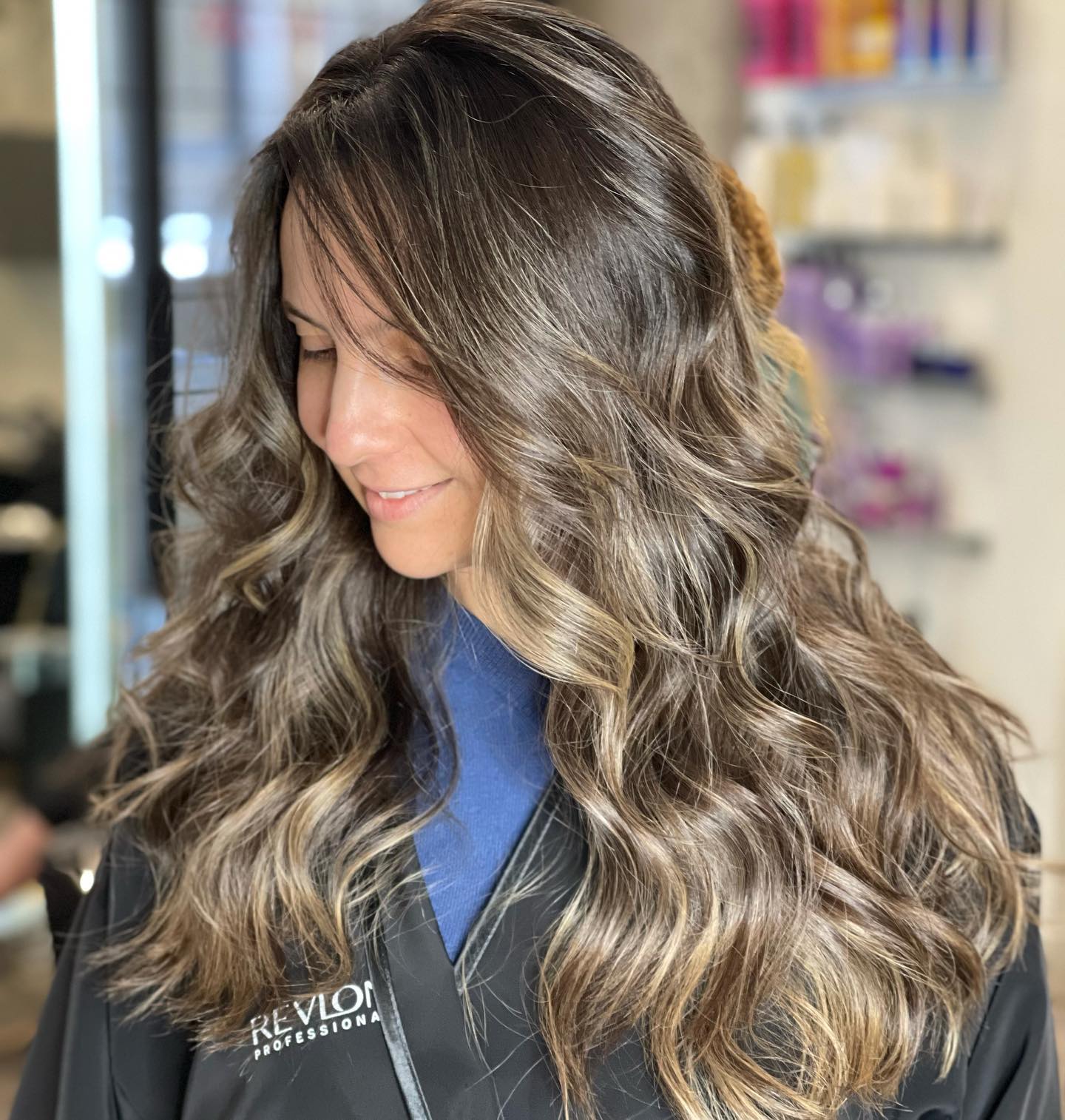 Balayage hair coloring and soft curls styled professionally at Professional Probelle partner salon